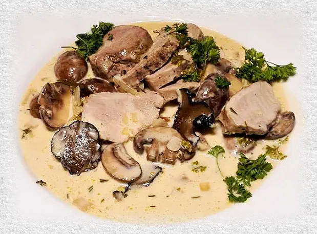 pork tenderloin in mushroom cream sauce with truffle