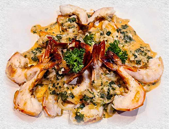 vlinders van tijgergarnalen in knoflookroomsaus